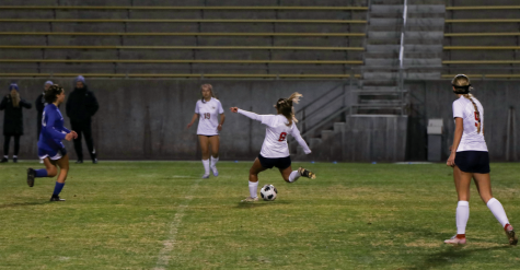 Alyssa Avalos, passing the ball to her teammate.