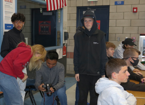 Chloe Boscariol and Krishna Sam reviewing footage taken at a Video Club meeting on Nov. 30.